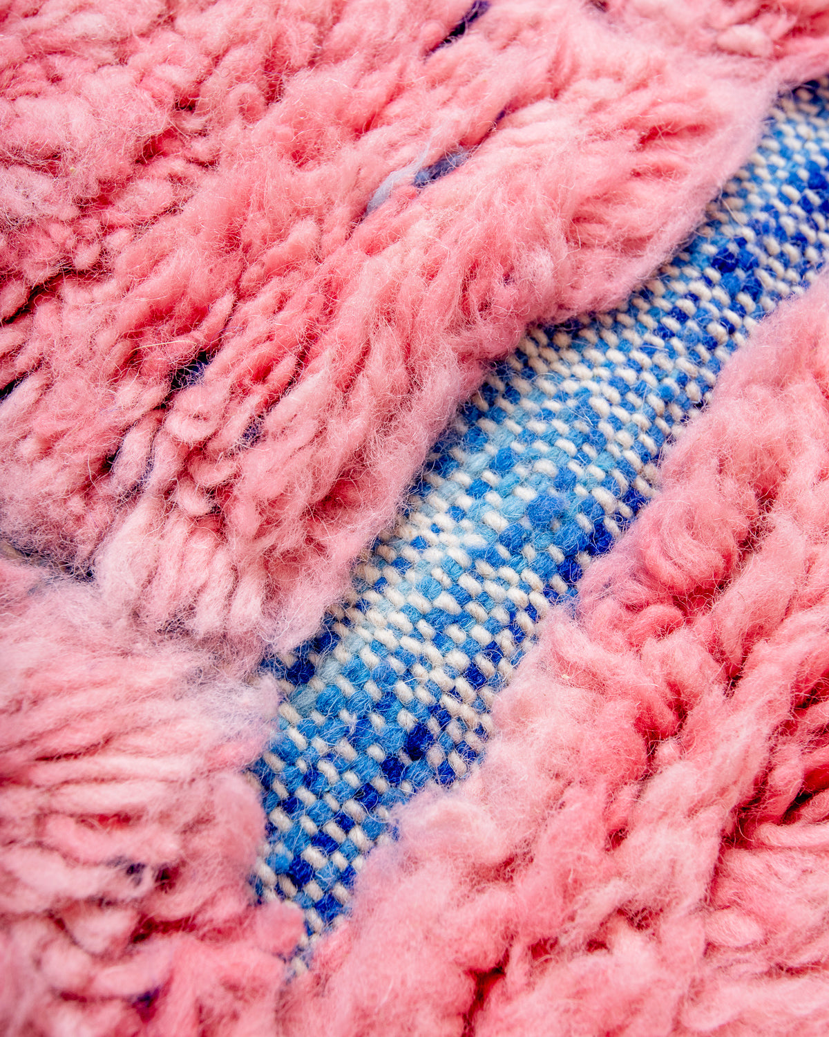 Modern, designer, handcrafted Berber rug from Morocco. Beniourain carpet with beautiful colours and patterns and fluffy wool texture.
